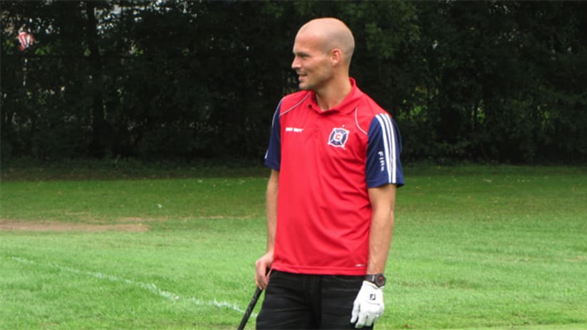 Freddie Ljungberg hangs out on the green before taking a shot