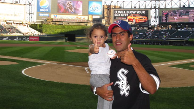 Nery, with his daughter Miriam before the first pitch