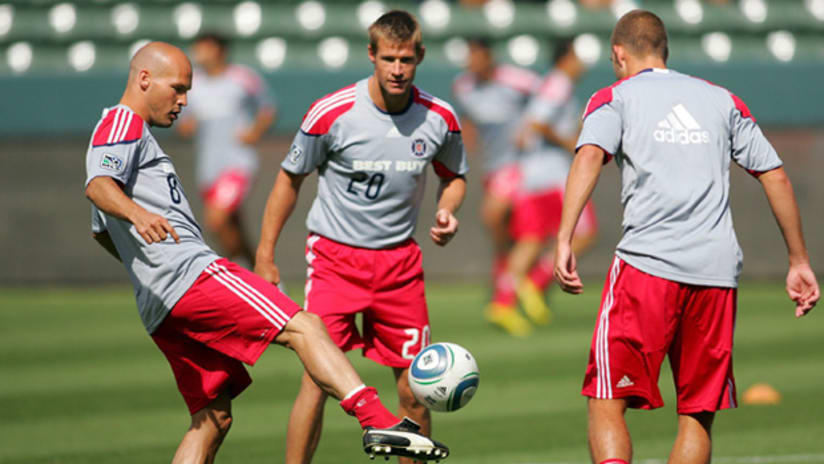 Chicago's Freddie Ljungberg (left) and Brian McBride (center) have developed a quick chemistry in the Fire camp.