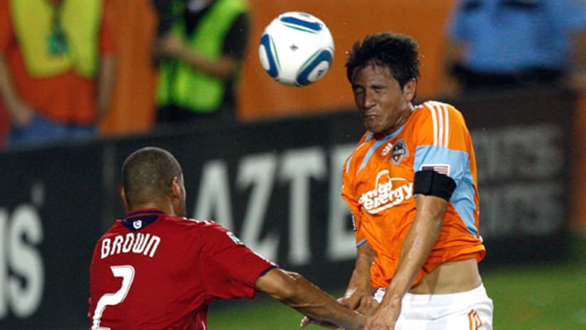 Dynamo's Brian Ching scores his third goal of the night