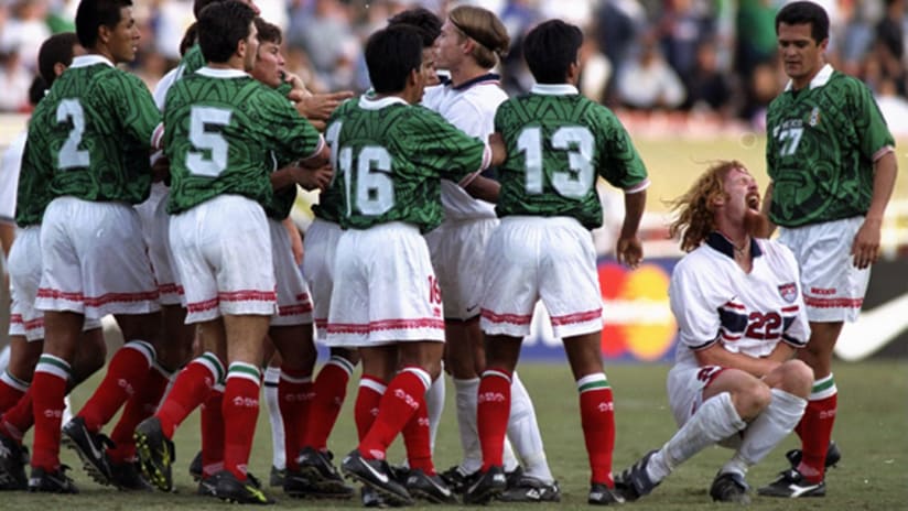 The US' Alexi Lalas (far right) reacts after a foul against Mexico during a 1997 US Cup match at the Rose Bowl in Pasadena, Calif.