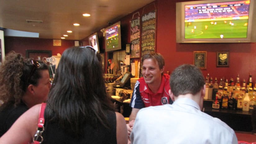 Andrew Dykstra Tends A Busy Bar