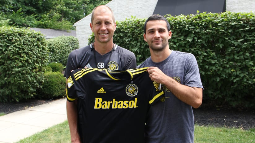 Gregg Berhalter and Dilly Duka with jersey 6-21-16