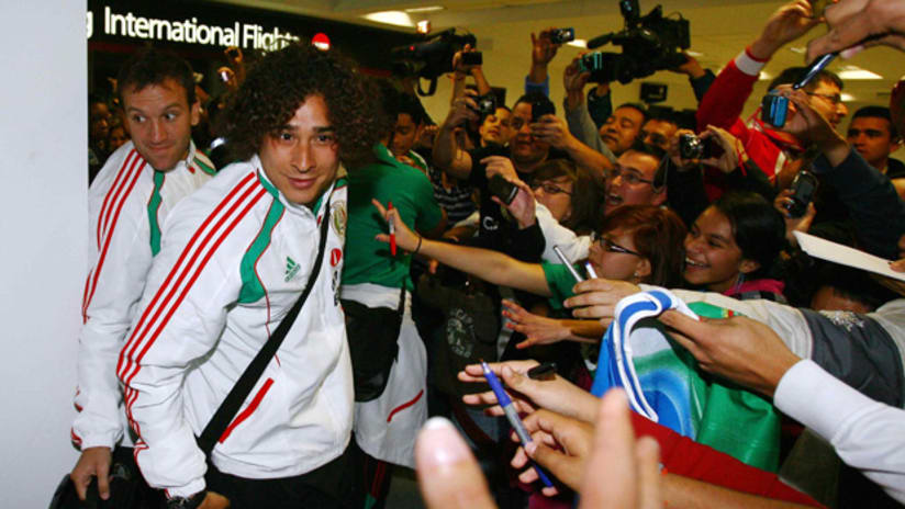 Guillermo Ochoa and his teammates are greeted by a throng of Mexican fans in Charlotte