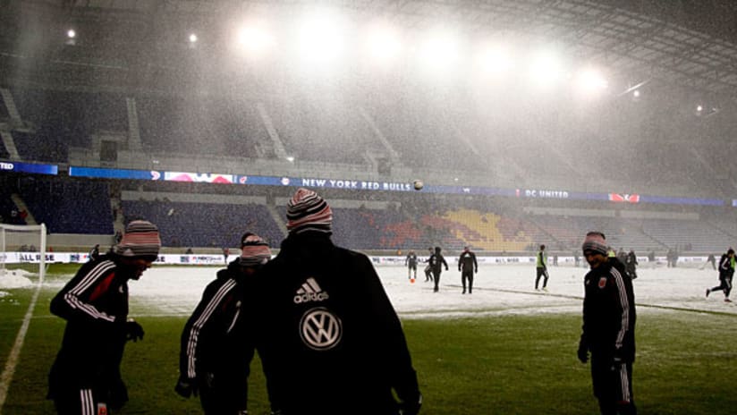 Players in the snow at Red Bull Arena