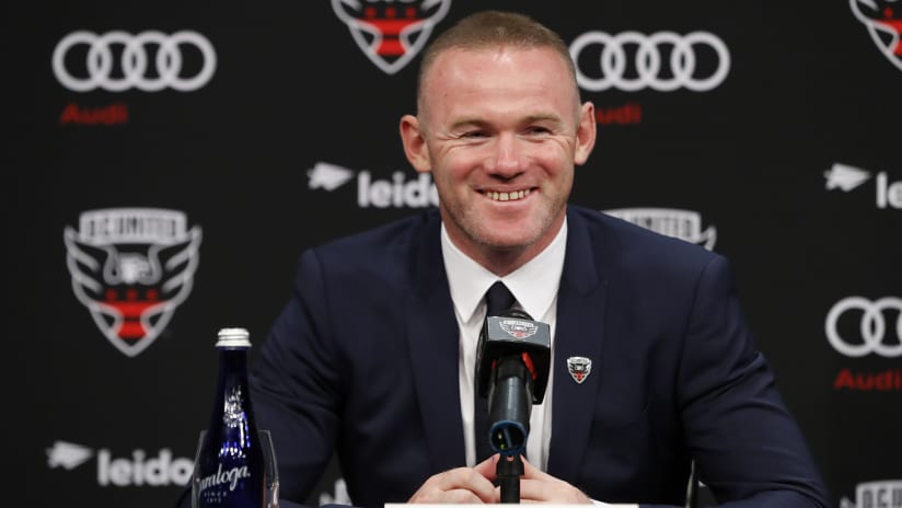 IMAGE: Rooney smile press conference
