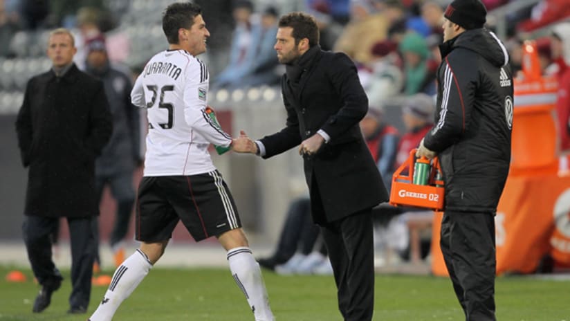 Santino Quaranta is congratulated by Ben Olsen after the former's goal against Colorado