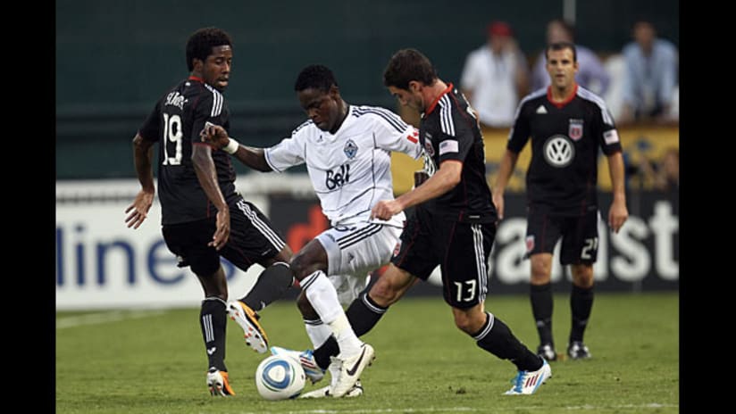 Clyde Simms, Gershon Koffie (middle), Chris Pontius