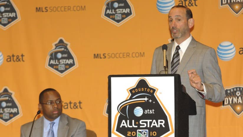 MLS Commissioner Don Garber addresses the media on Tuesday as AT&T representative Tyrone Moore looks on.