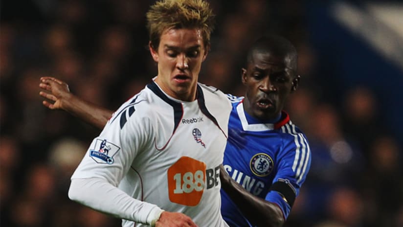 Bolton's Stuart Holden (left) challenges Chelsea's Ramires on Wednesday at Stamford Bridge in London.