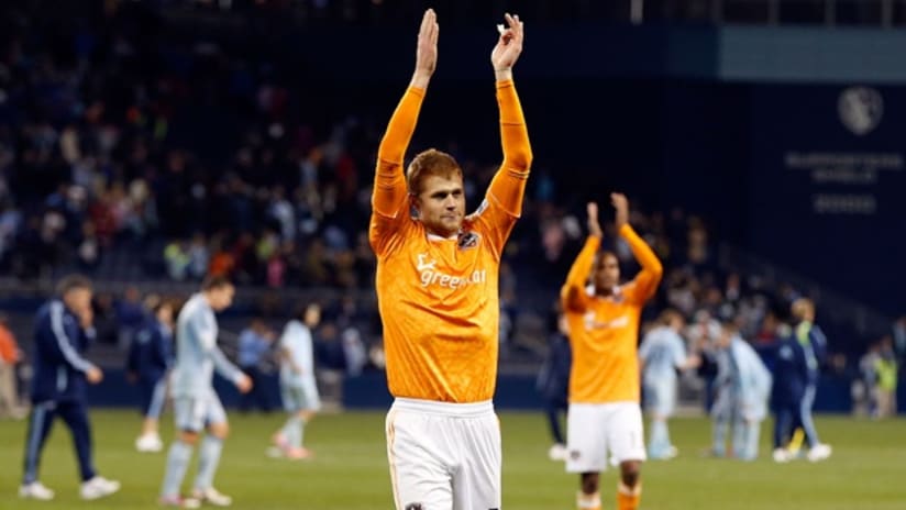 Andre Hainault applauds Dynamo fans