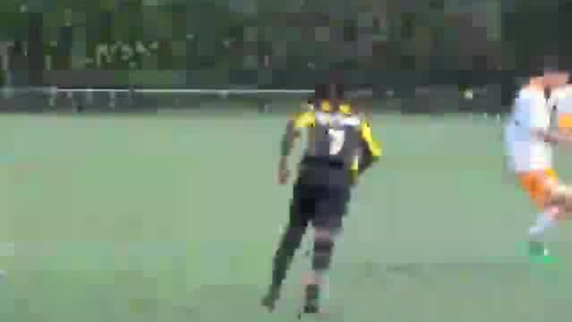 LA attacker avoids a tackle from RSL defender.