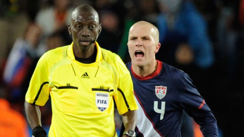 US midfielder Michael Bradley gives head referee Koman Coulibaly some feedback on the game's controversial non-goal.