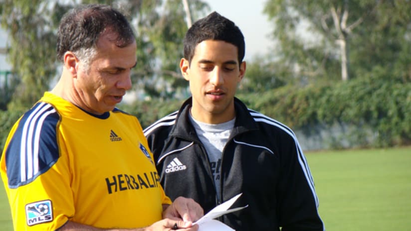 bruce arena with AP trainer