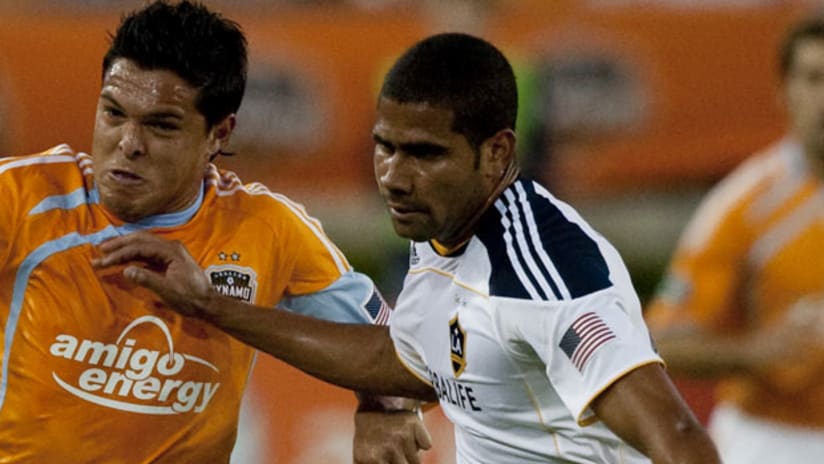 Leonardo (right) and the Galaxy defense have pushed opponents around this season.