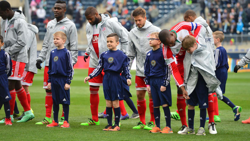 Revs give up their coats for the kids