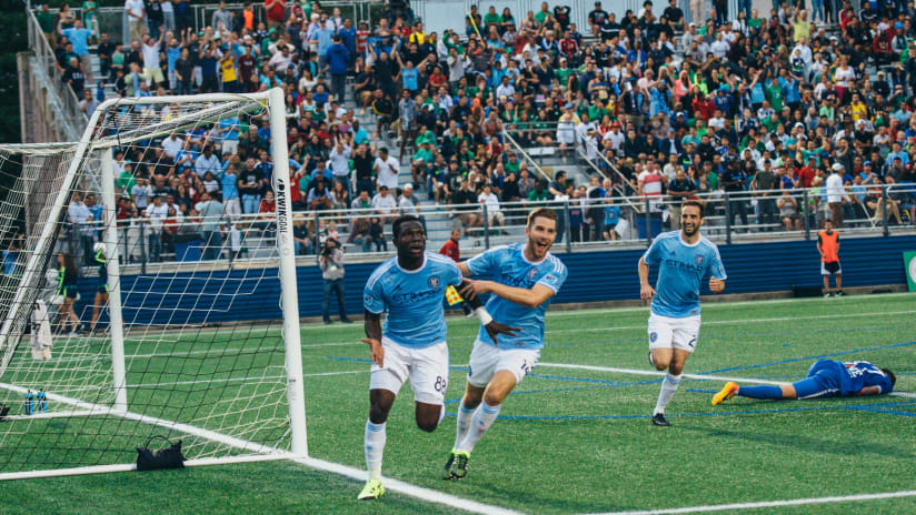 Poku celebrates his first goal against the Cosmos