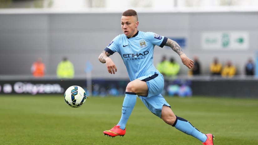 Angelino playing for Manchester City EDS