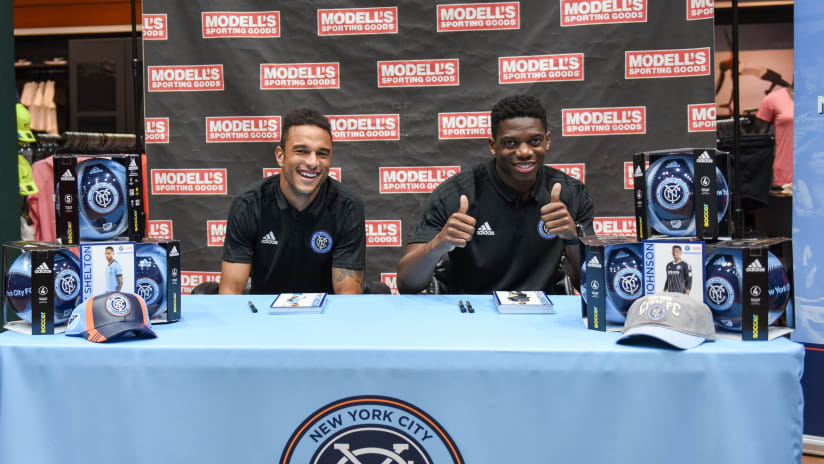 Khiry Shelton and Sean Johnson at Modell's Smiling