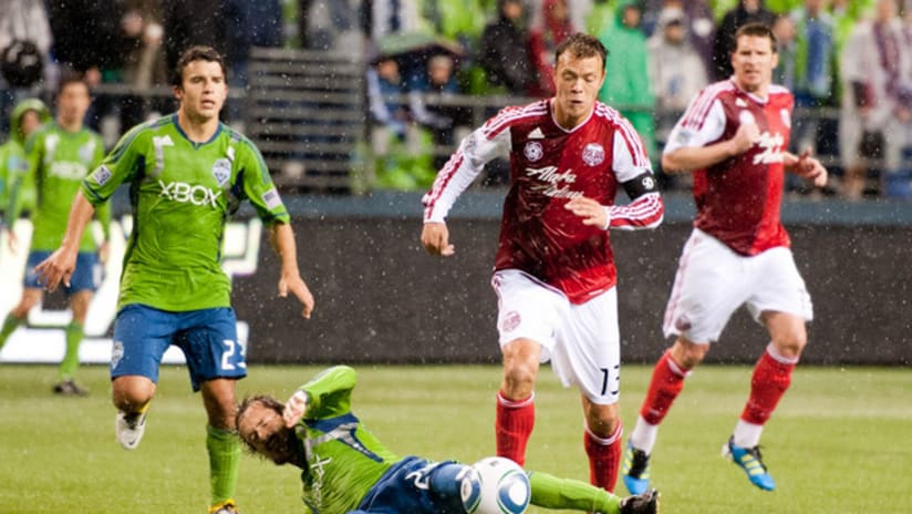 Jack Jewsbury jumps over Roger Levesque, Timbers @ Sounders, 5.14.11