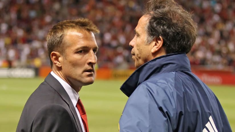Jason Kreis (left) and Bruce Arena (right) have one more weekend to determine the Supporters' Shield race
