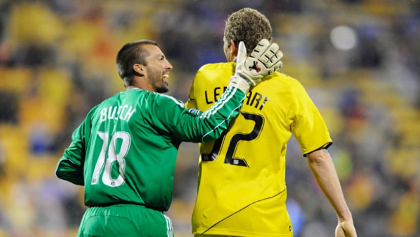 San Jose's Jon Busch shares a laugh with the Crew's Steven Lenhart during the teams' scoreless draw on Saturday.