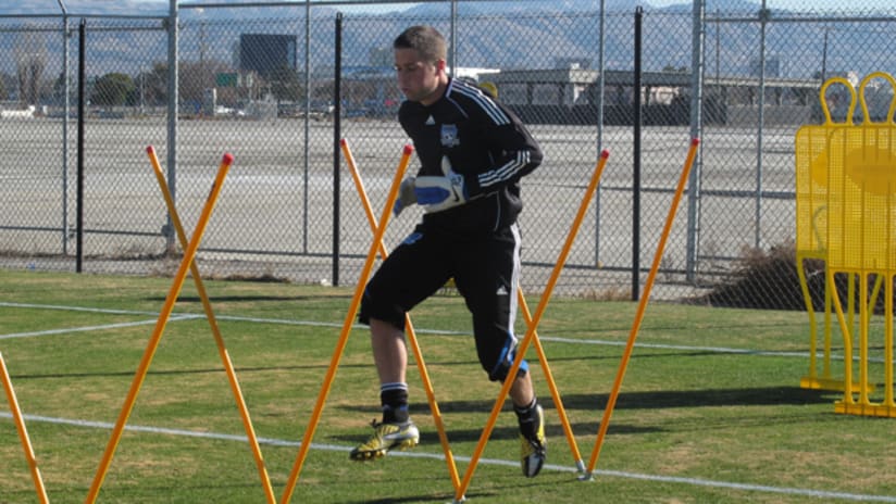Rookie goalkeeper Chris Blais works through drills on Day 1 of training camp