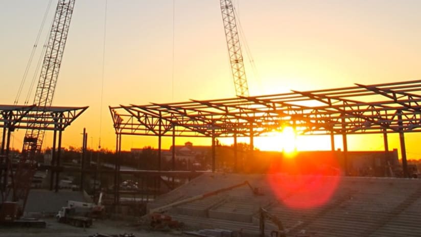 Sunrise view before crews lifted the final roof truss in place.