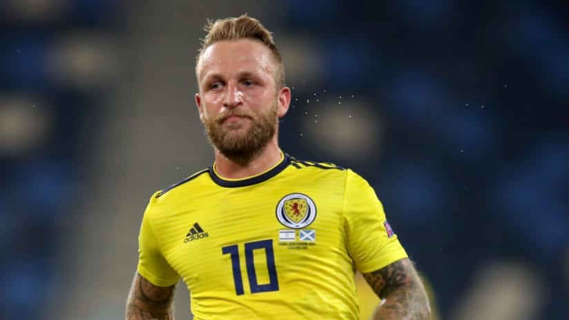 Johnny Russell in yellow Scotland kit