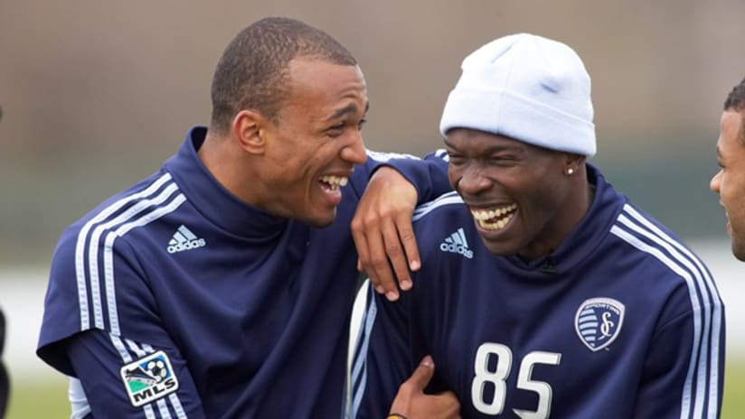 Chad Ochocinco and Teal Bunbury have a laugh after Sporting practice