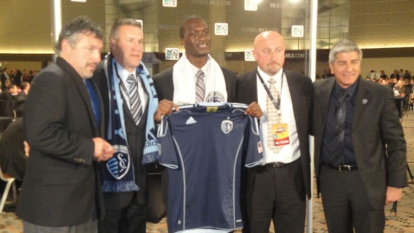 C.J. Sapong poses with the Sporting Kansas City coaching staff.