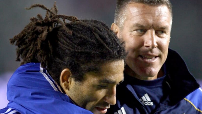 Manager Peter Vermes celebrates beating LA with mid Stephane Auvray.