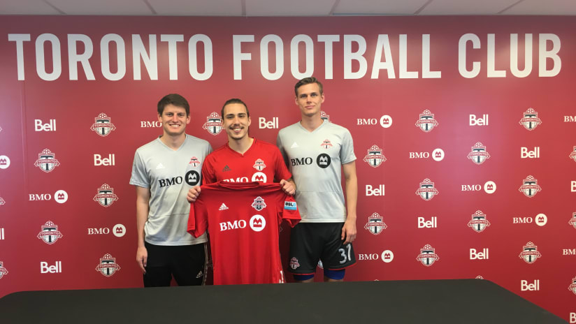 Three TFC II signings