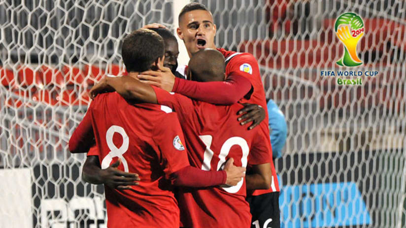 Canadian players celebrate a goal against St. Lucia (CanadaSoccer.com)