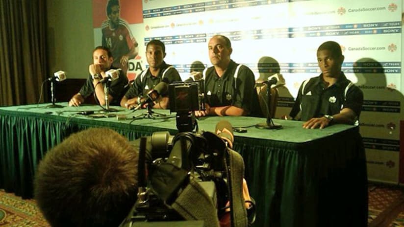 Stephen Hart (second from right) at pregame press conference.