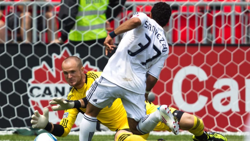 Stefan Frei dives to save a shot from Camilo (Paul Giamou)