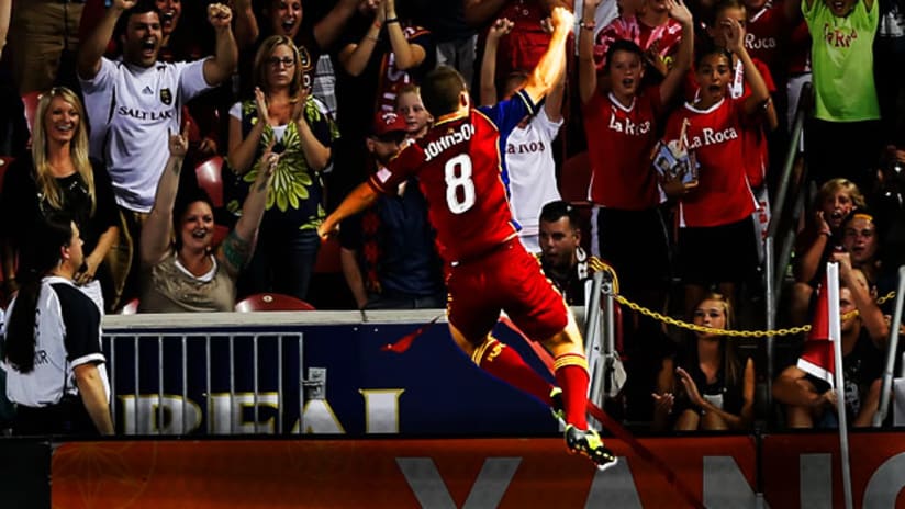 RSL's Will Johnson leaps high to celebrate his goal.