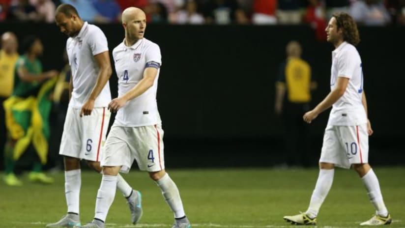 John Brooks, Michael Bradley and Mix Diskerud (USMNT) walk off the field after losing in 2015 Gold Cup