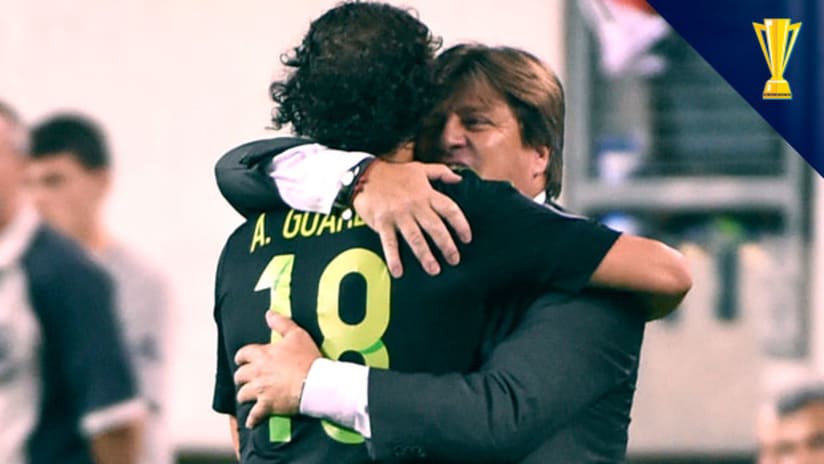 Herrera and Guardado hug after Mexico win Gold Cup 2015