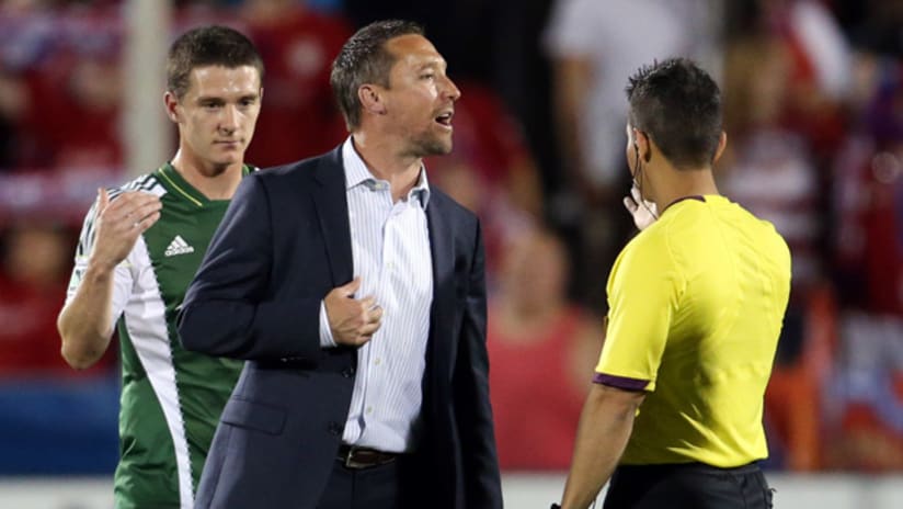 Portland Timbers head coach Caleb Porter argues with the referee