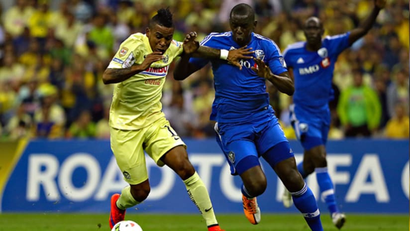 Michael Arroyo of Club America gets a step on Hassoun Camara of the Montreal Impact in CCL play
