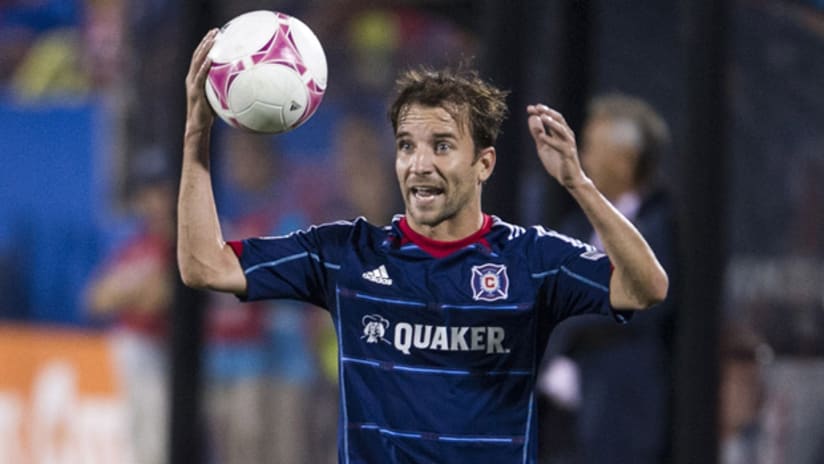 Mike Magee takes a throw-in