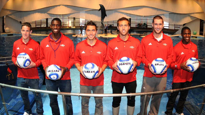 (From left) John Rooney, Jalil Anibaba, Michael Farfan, A.J. Soares, Will Bruin, and Kofi Sarkodie at the National Aquarium.