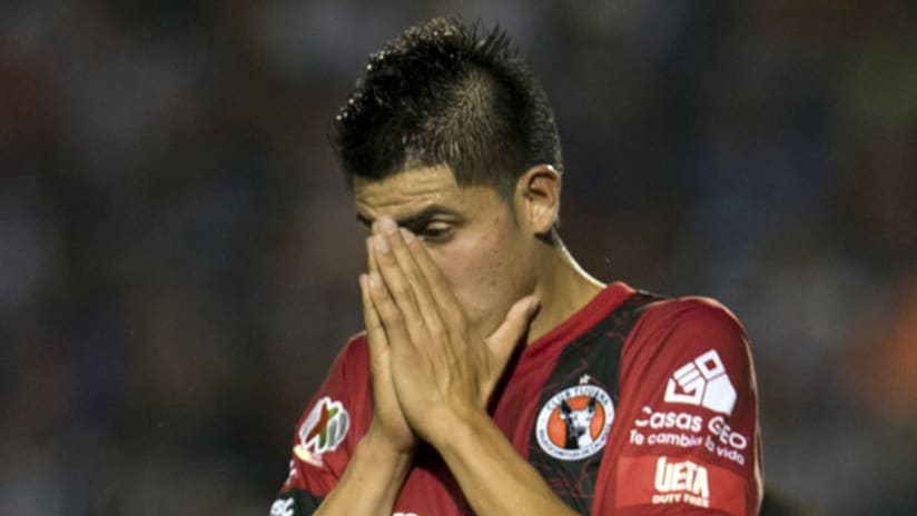 Joe Corona reacts to missing a goal for Club Tijuana