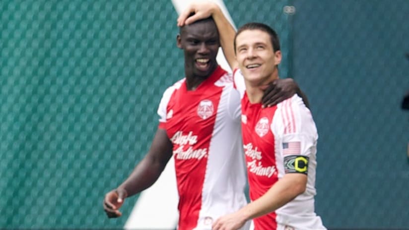 Will Johnson and Pa Modou Kah are all smiles