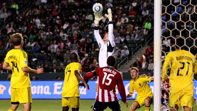 Crew goalkeeper William Hesmer skies to grab a Chivas USA chance on Saturday night at The Home Depot Center.