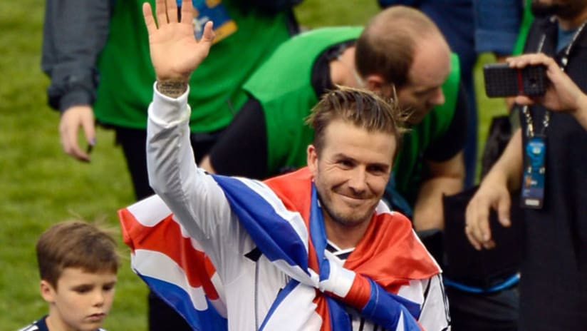 David Beckham salutes the fans