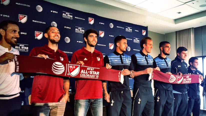 MLS All-Stars and Tottenham Hotspur players post with the 2015 MLS All-Star scarf at a press conference