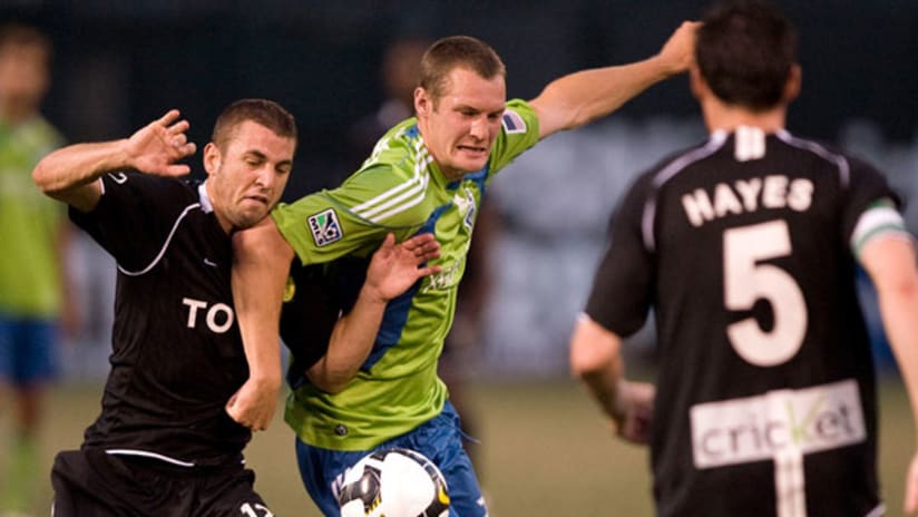 Oregon native Nate Jaqua's Sounders open their USOC title defense against the Timbers.