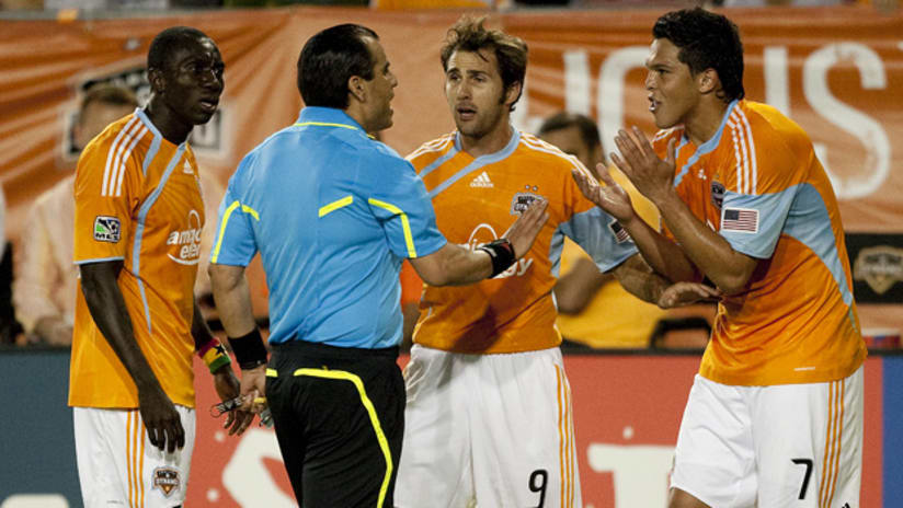 Luis Angel Landin implores with the ref after getting ejected in the first half